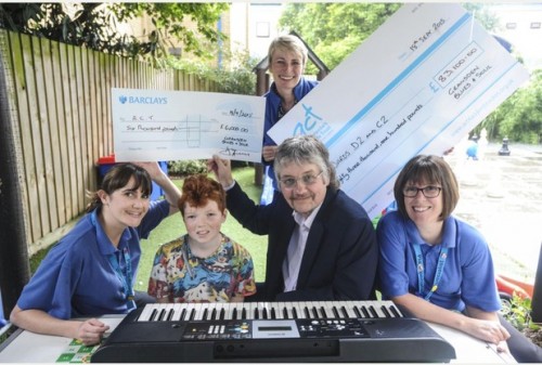 Don Airey with the staff of children's ward at Addenbrooke's Hospital