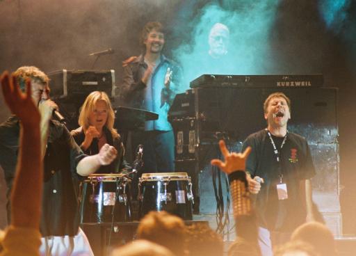 Ian Gillan, unnamed female fan, Don Airey, Jon Lord, and Bruce Dickinson onstage 2002-09-07.